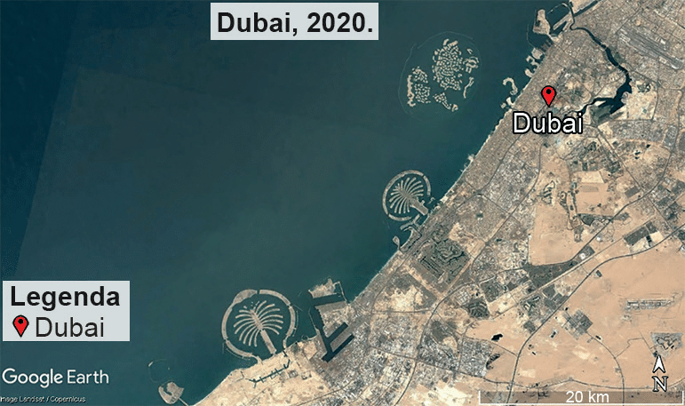 Imagem de satélite de Dubai em 2020, mostrando extensa ocupação urbana, ilhas artificiais junto à costa, legenda de localização e escala de 20 quilômetros.